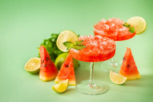 watermelon,frozen,cocktail,margarita,with,fresh,watermelon,,lime,and,mint