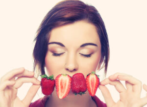 young,happy,girl,with,fresh,strawberries