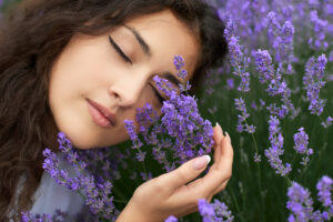 beautiful,young,woman,portrait,on,lavender,flowers,background,,face,closeup