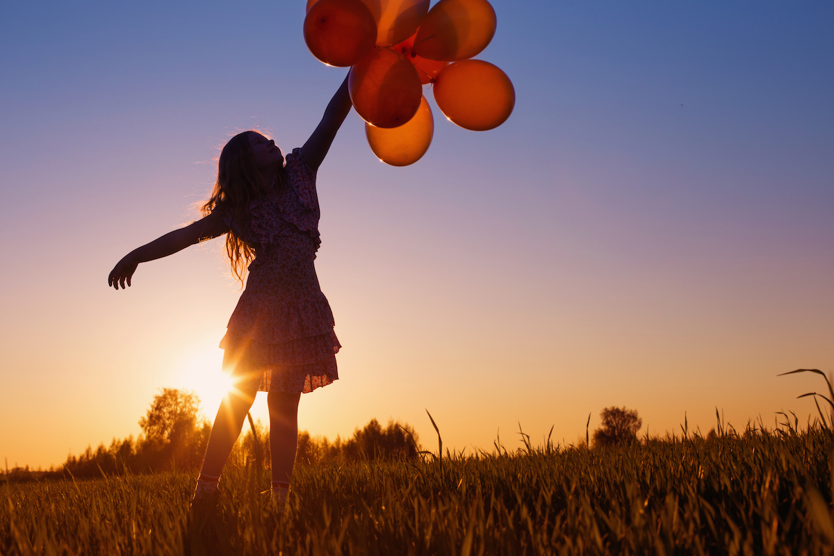 girl,with,balloons,outdoor